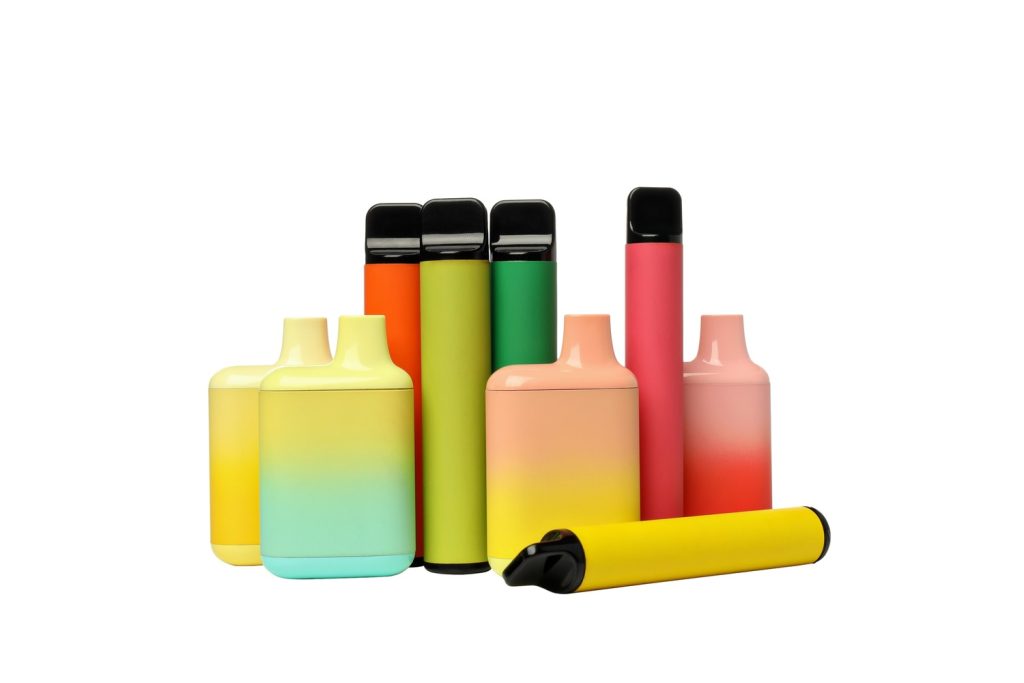 Colorful vape devices displayed for sale at a vibrant cigarette shop Tulsa.