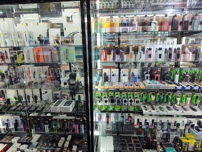 Shelves filled with vape devices and smoking products at a cigar shop Tulsa.