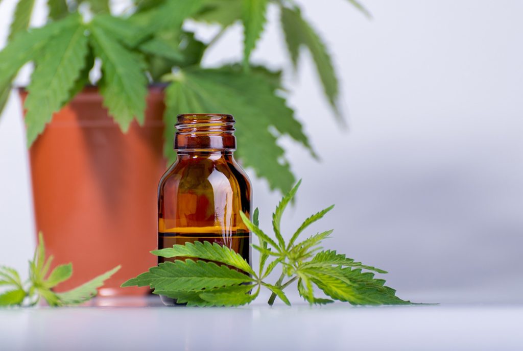 Glass bottle of high-quality CBD oil tincture for sale at a local cbd store tulsa retail location.