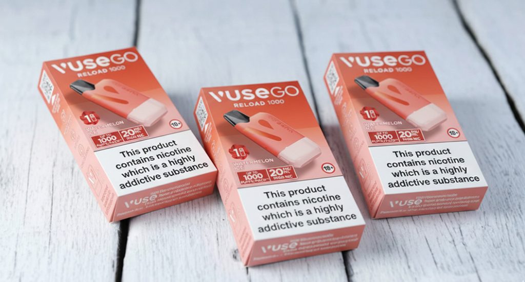 Three boxes of Vuse Go Reload 1000 nicotine pods on a white wood surface, sold at your local vape shop Tulsa.