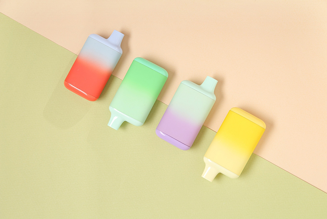 Four square, pastel-ombre disposable vapes lined up diagonally on a two-tone background, featuring the best disposable vapes Tulsa.