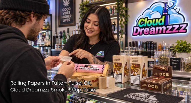Friendly staff member assisting a customer with rolling papers in Tulsa at Cloud Dreamzzz Smoke Shop in Fulton